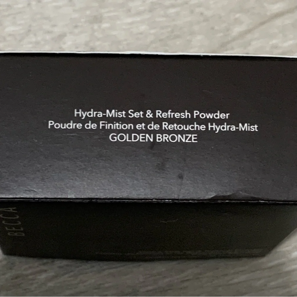 Becca hydra-mist setting and refreshing powder golden brown